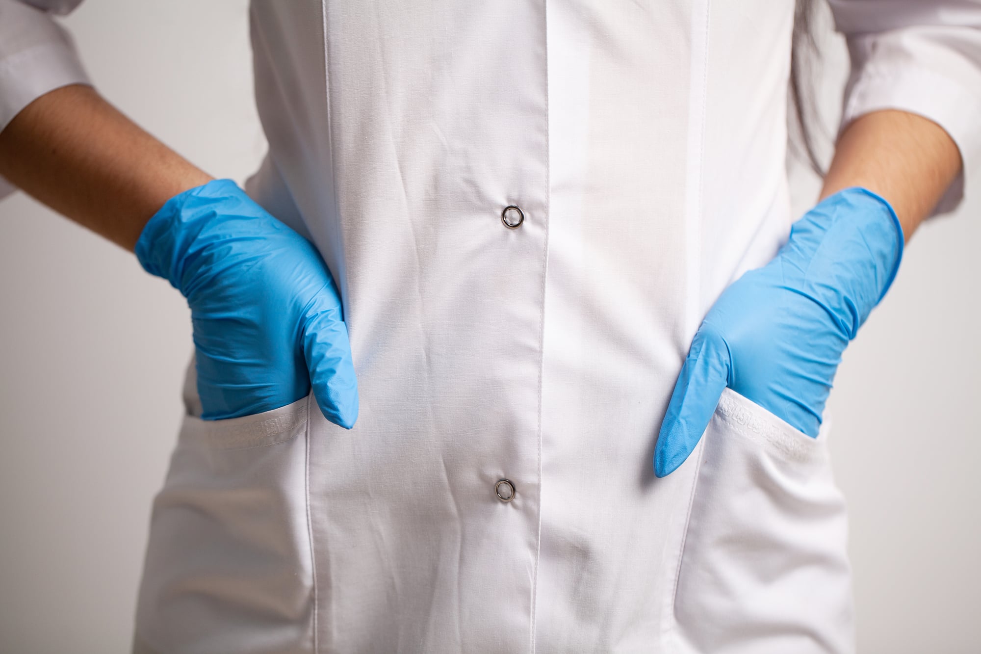 Professional wearing protective gloves